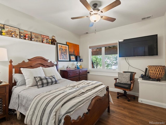 6405 Warriors Run, Littleton, CO 80125 - bedroom with wood finished floors, a ceiling fan, and baseboards