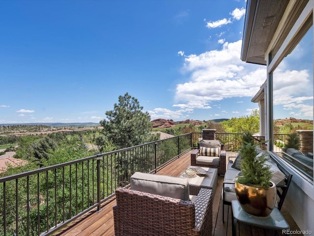 6405 Warriors Run, Littleton, CO 80125 - balcony with an outdoor living space