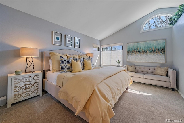 carpeted bedroom featuring high vaulted ceiling