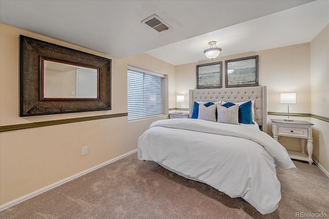 bedroom featuring carpet floors, baseboards, and visible vents