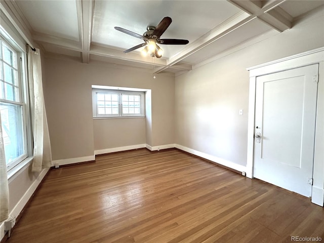 unfurnished room with beamed ceiling, hardwood / wood-style floors, ceiling fan, and coffered ceiling