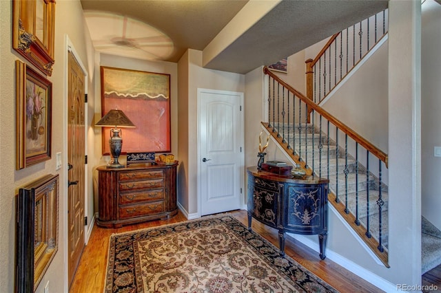 hall featuring light hardwood / wood-style floors