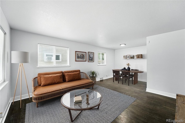 1941 Alton St, Aurora, CO 80010 - living room featuring wood finished floors and baseboards