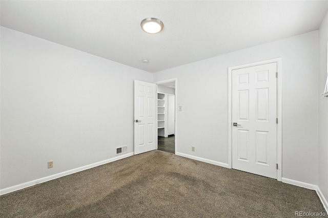 1941 Alton St, Aurora, CO 80010 - unfurnished bedroom featuring carpet flooring and baseboards