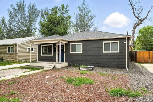 1941 Alton St, Aurora, CO 80010 - view of front facade featuring a shingled roof