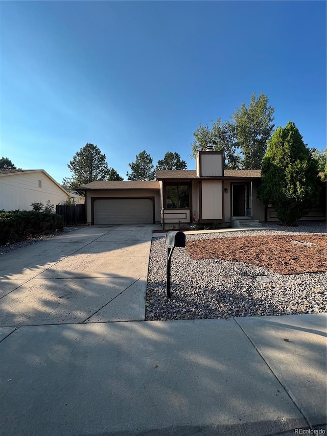 single story home featuring a garage