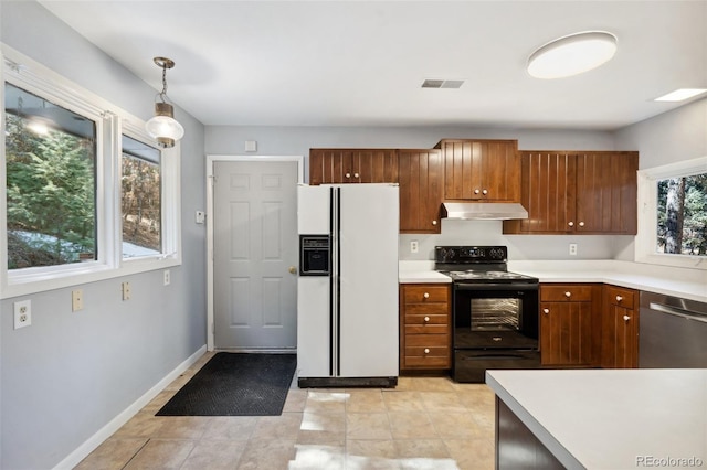 4835 Abo Ln, Monument, CO 80132 - kitchen with white refrigerator with ice dispenser, black range with electric stovetop, dishwasher, light countertops, and decorative light fixtures