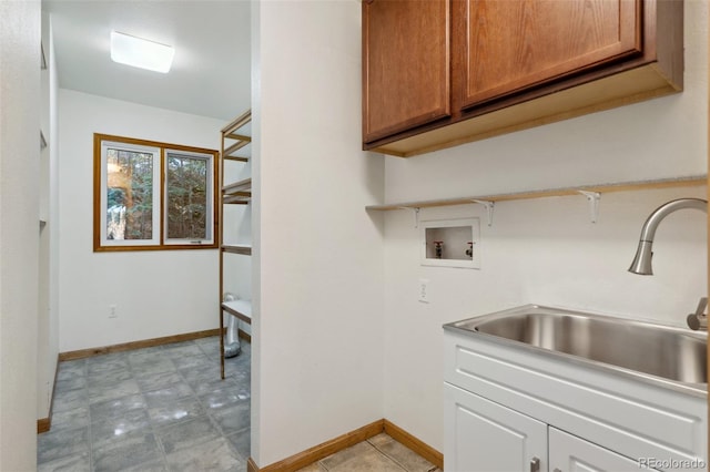 4835 Abo Ln, Monument, CO 80132 - laundry room with cabinet space, washer hookup, and baseboards