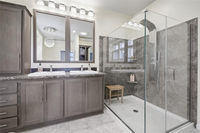 bathroom with vanity and walk in shower