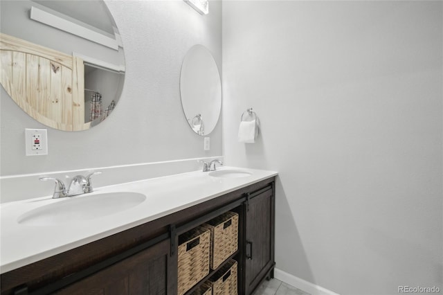 bathroom featuring vanity and tile patterned flooring