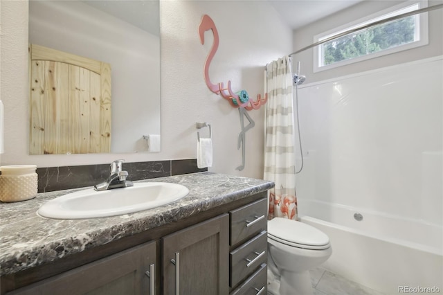 full bathroom with vanity, shower / tub combo, tile patterned flooring, and toilet