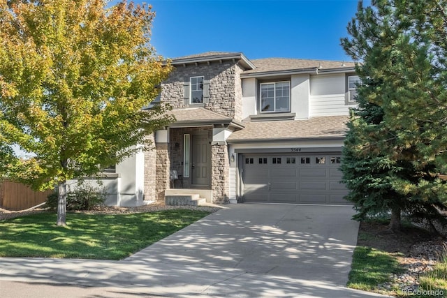 view of front facade featuring a front yard and a garage