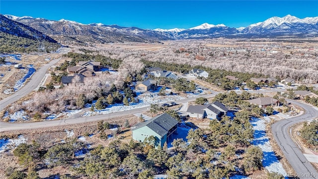 drone / aerial view featuring a mountain view