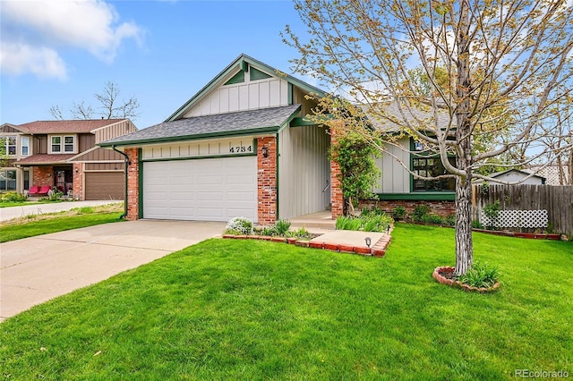 view of front of property with a garage, fence, concrete driveway, a front yard, and brick siding
