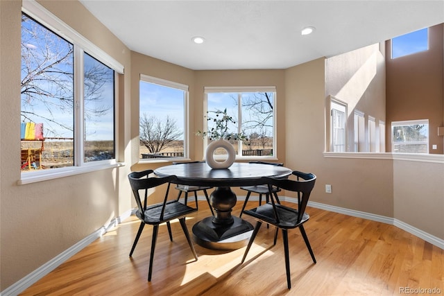 dining area with light wood-type flooring