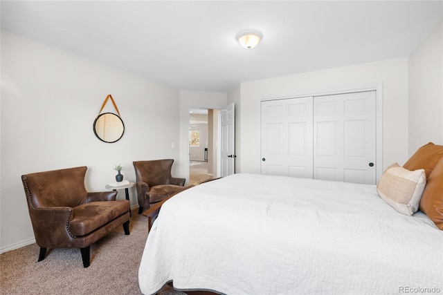 bedroom with carpet floors and a closet