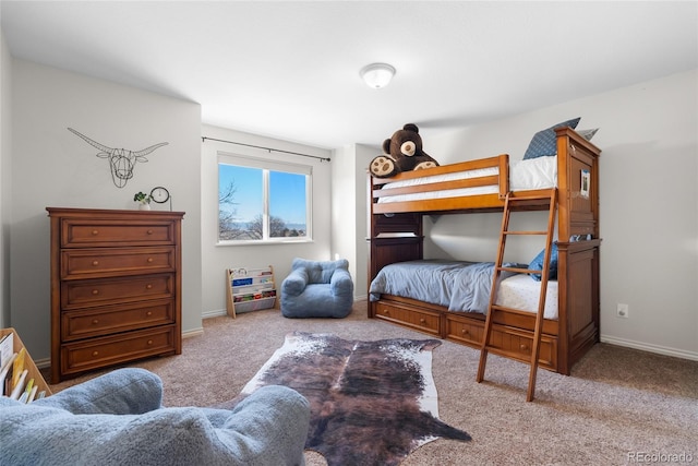 bedroom with light colored carpet