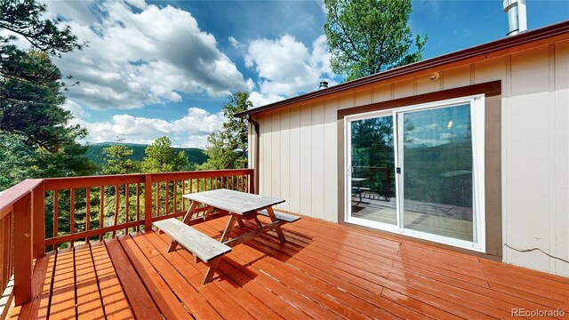 60 Ball Rd, Bailey, CO 80421 - wooden deck with outdoor dining space