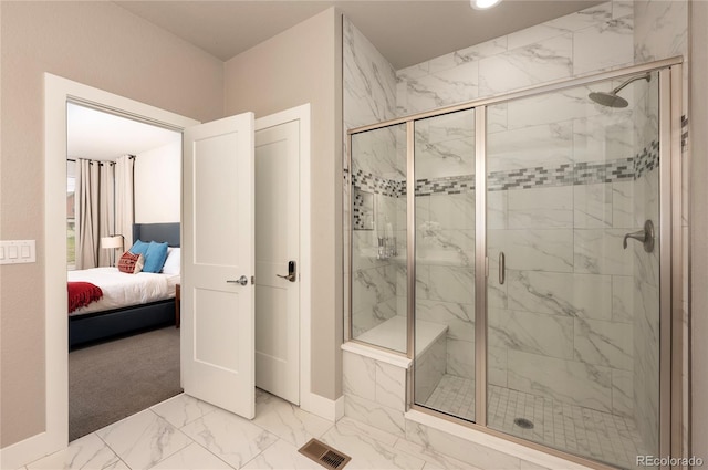 full bath featuring marble finish floor, visible vents, a marble finish shower, ensuite bath, and baseboards