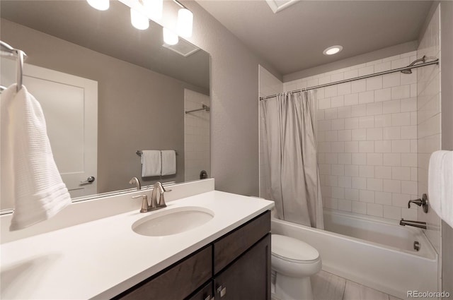 bathroom with recessed lighting, shower / tub combo, toilet, and vanity