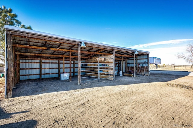 view of outdoor structure featuring an exterior structure and an outbuilding