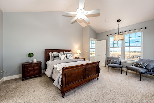 bedroom featuring lofted ceiling, light carpet, ceiling fan, and baseboards