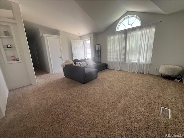 235 Marion St, Burlington, CO 80807 - carpeted living area featuring vaulted ceiling