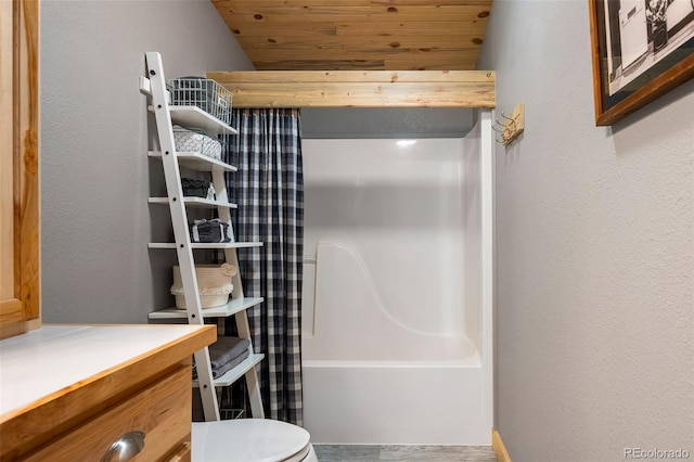 110 County Road 652, Grand Lake, CO 80447 - full bathroom with toilet, wood ceiling, a textured wall, and shower / bath combination