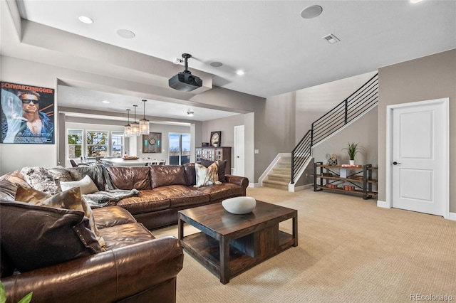 9563 Red Primrose St, Franktown, CO 80116 - living area with light carpet, stairs, and recessed lighting