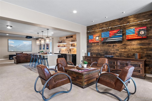 9563 Red Primrose St, Franktown, CO 80116 - living area featuring wet bar, wood walls, light carpet, and recessed lighting