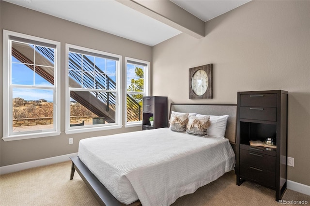 9563 Red Primrose St, Franktown, CO 80116 - carpeted bedroom featuring baseboards and beamed ceiling