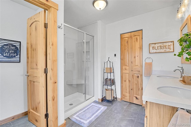 10786 Marclif Rd, Conifer, CO 80433 - bathroom featuring a stall shower, tile patterned floors, and double vanity