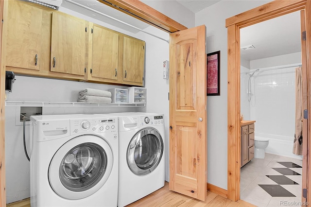 10786 Marclif Rd, Conifer, CO 80433 - washroom with cabinet space and washing machine and clothes dryer