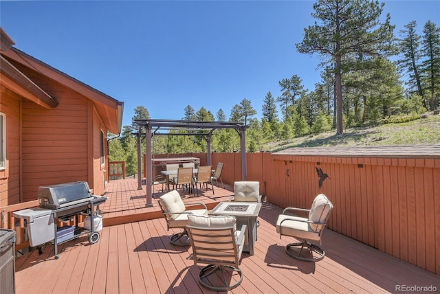 10786 Marclif Rd, Conifer, CO 80433 - deck featuring outdoor dining space, a fire pit, and a grill