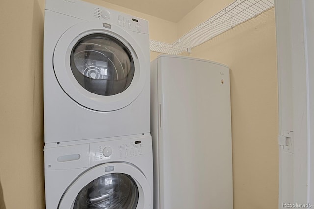 1876 S Pitkin Cir Unit B, Aurora, CO 80017 - laundry room with stacked washing machine and dryer