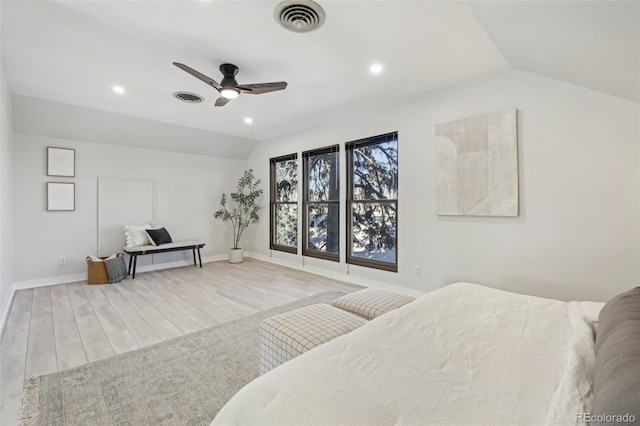 bedroom featuring recessed lighting, visible vents, wood finished floors, and lofted ceiling