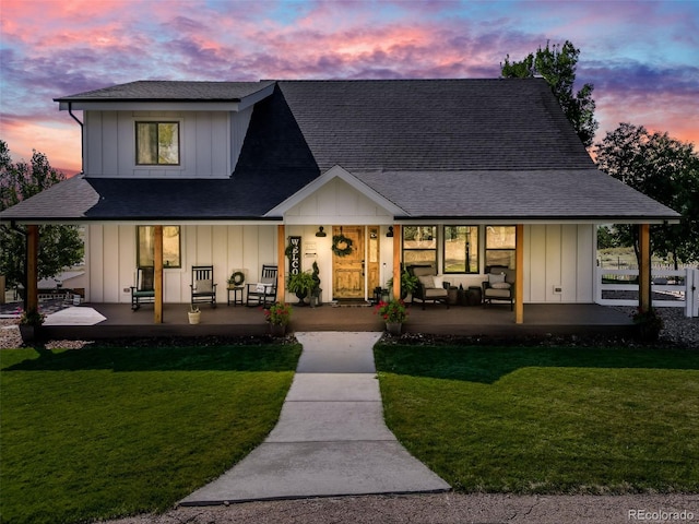 view of front of house with a lawn