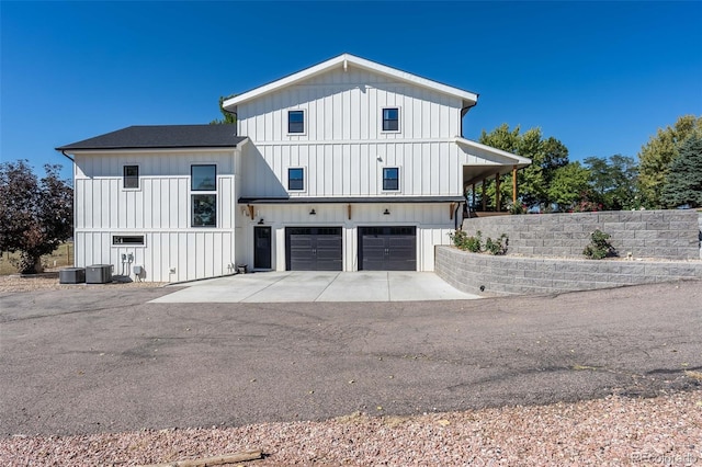 view of side of property featuring a garage