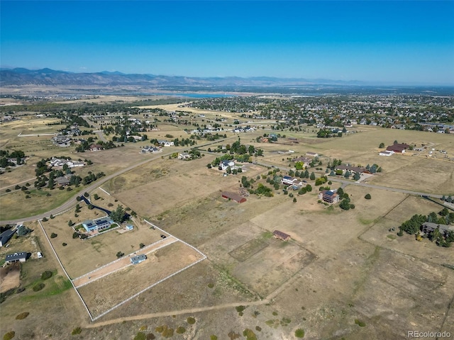 drone / aerial view featuring a mountain view