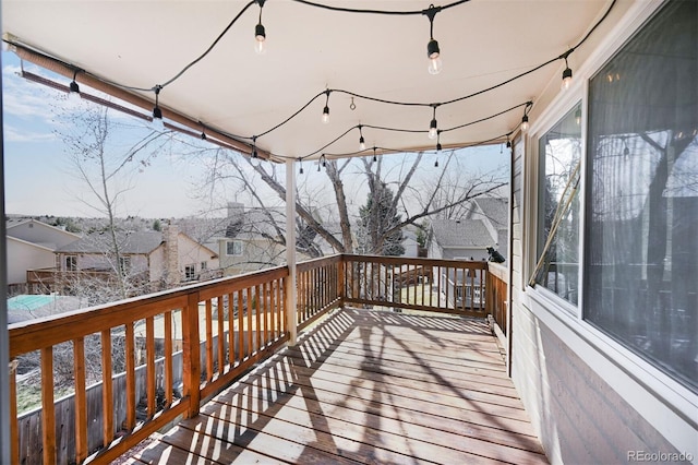 wooden deck featuring a residential view