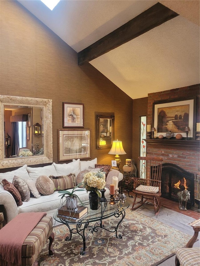 living area with vaulted ceiling with beams and a brick fireplace