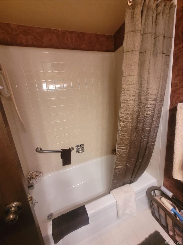 full bath with tile patterned flooring and shower / bathtub combination with curtain