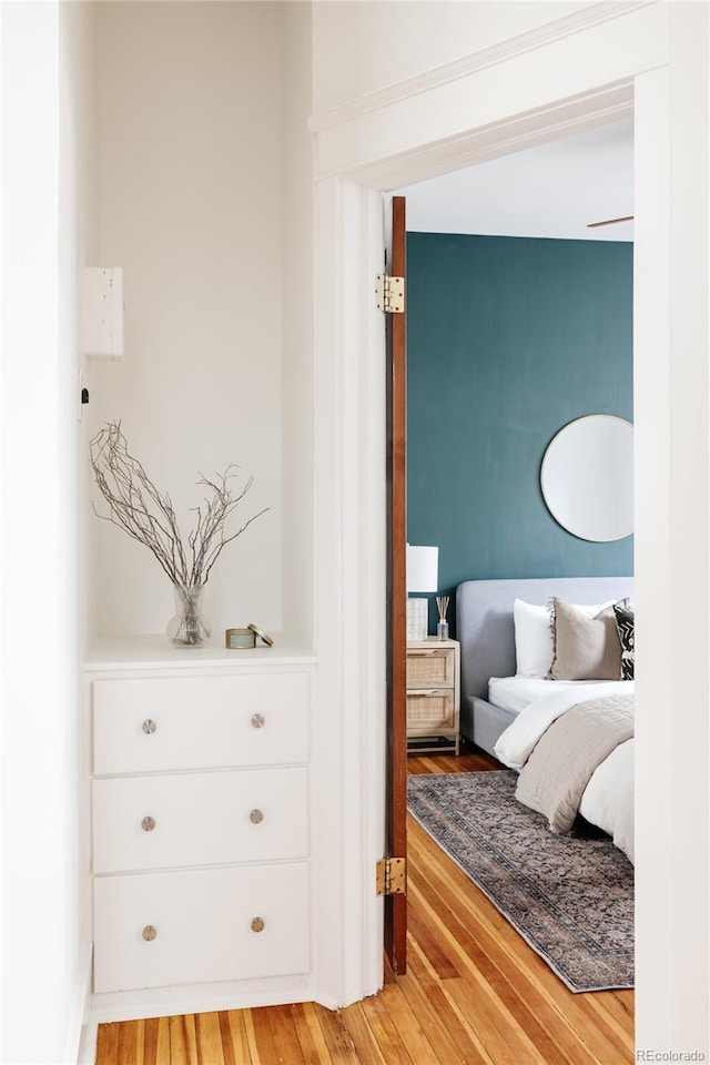 bedroom featuring light wood-style floors