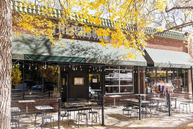 view of property's community with a patio area