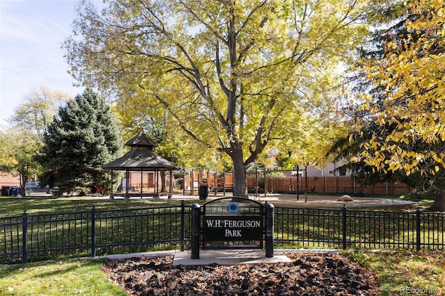 surrounding community featuring a gazebo and fence