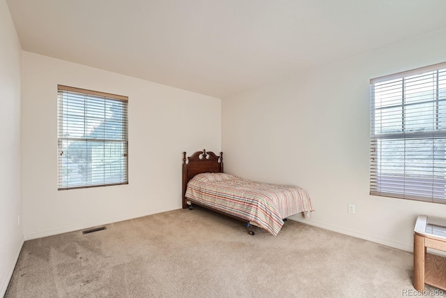 5892 W 94th Pl, Westminster, CO 80031 - bedroom with carpet floors and baseboards