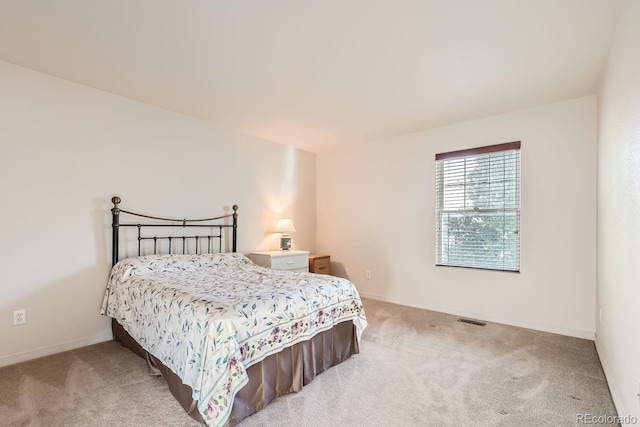 5892 W 94th Pl, Westminster, CO 80031 - bedroom with light colored carpet and baseboards
