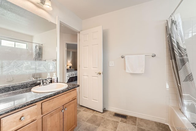 bathroom with vanity and shower / bathtub combination with curtain