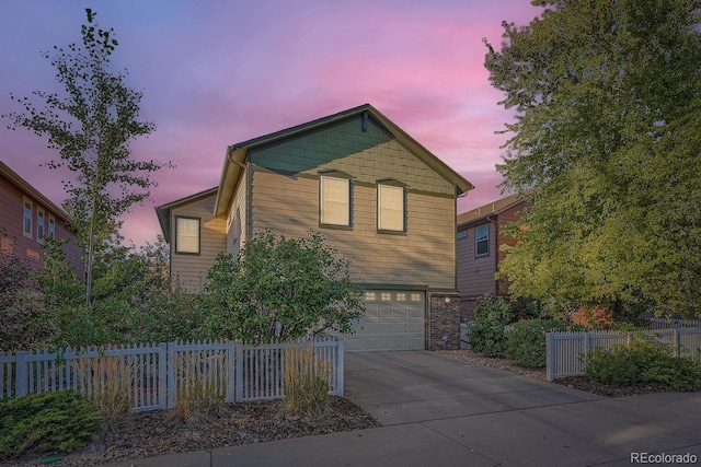 view of front of home with a garage