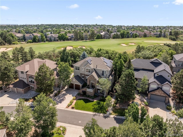 bird's eye view featuring view of golf course and a residential view